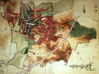 Wirtschaftsplan der Stadt mit den dominierenden landwirtschaftlichen Flächen (rot) und der nördlich und westlich vorbeilaufenden geplanten Autobahntrasse (weißes Band) (um 1950)