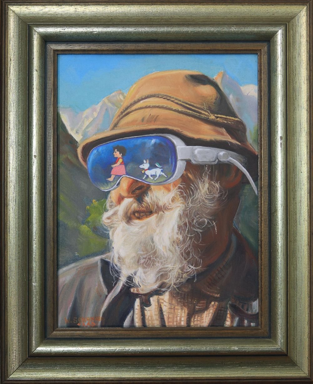 Bild in Rahmen von einem älteren Mann mit Bart, in der Brille von ihm ist Heidi eingezeichnet