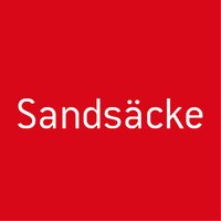 Rotes Feld mit Text: Sandsäcke