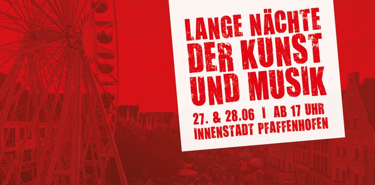 rote Kachel mit Riesenrad am Hauptplatz im Hintergrund